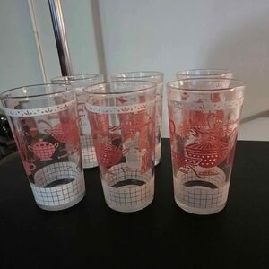 Vintage Libbey Hostess Kitchen drinking glasses with a pink and white design.